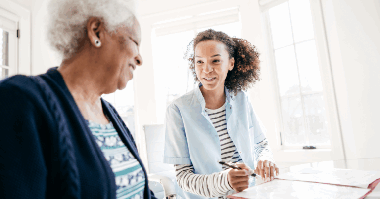 Working for an agency, like this caregiver who’s with a client, can be a choice that leads to a good job.